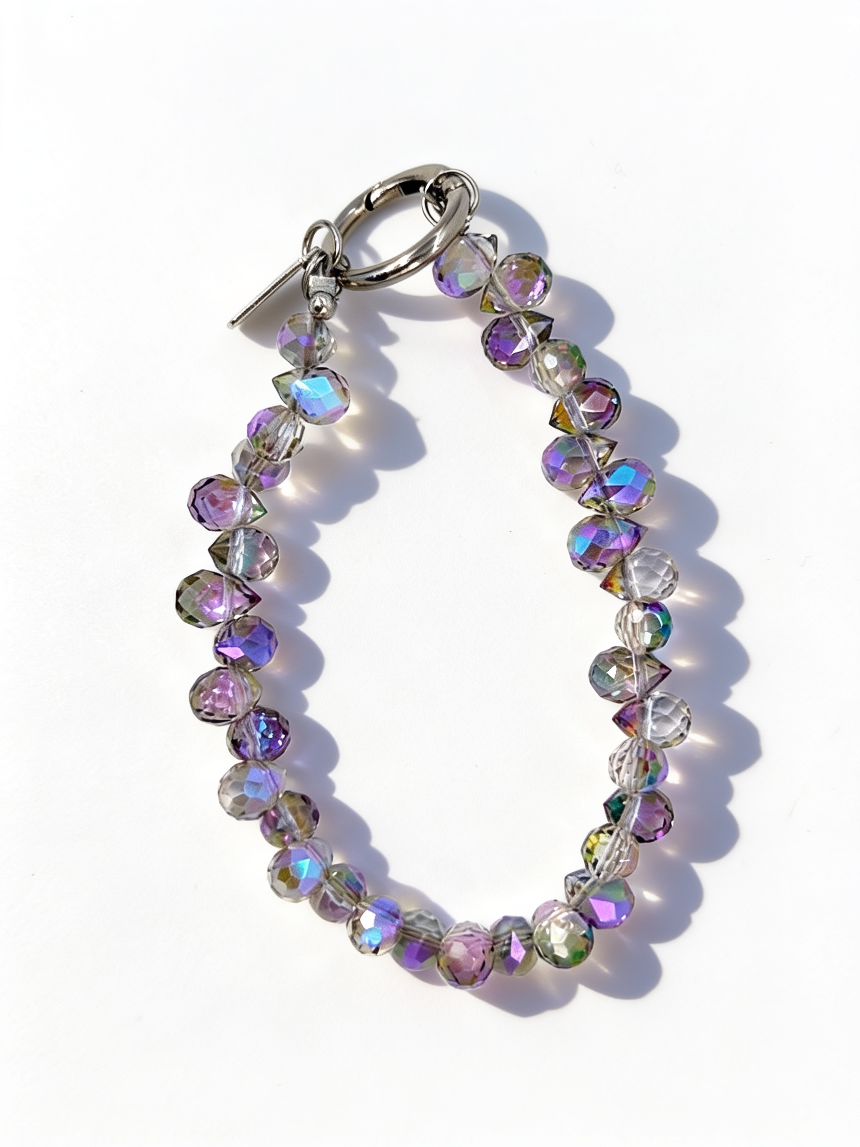 Mystic Crystal Phone Strap — included in The Noir Kit